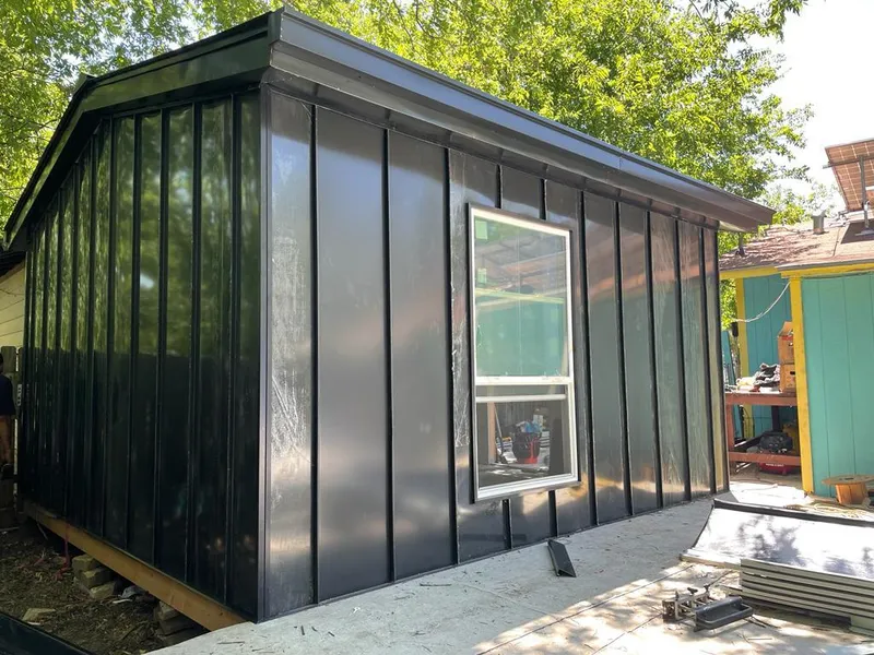 Black standing seam metal wall panels for Metal Roof Installation in Onalaska