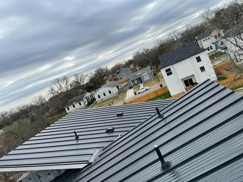 Standing seam metal roof panels with vents for Skylight Repair in Onalaska